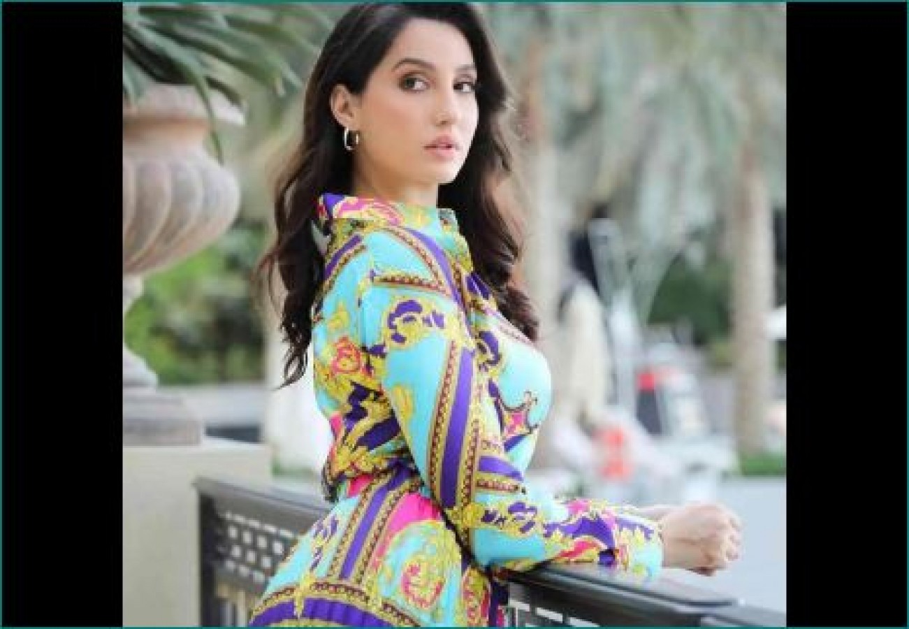 Nora Fatehi in a pristine white crochet dress and Rs 3 lakh bag is queen of  elegance - India Today