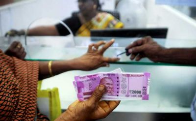 Rupee edged lower by 2 paise against US dollar