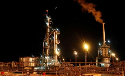 Oil prices climb after surprise cuts in output