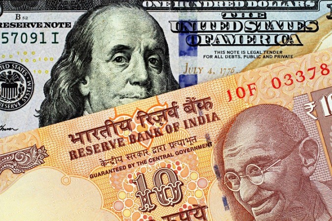 Rupee drops 6 paise to 76.60 against dollar ahead of the Fed's decision.