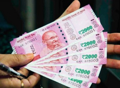 Rupee rises 20 paise to 77.51 per dollar, breaking a record low