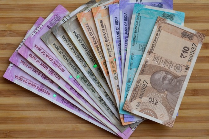 Indian Rupee closes 6 paise higher at 74.58 versus US dollar