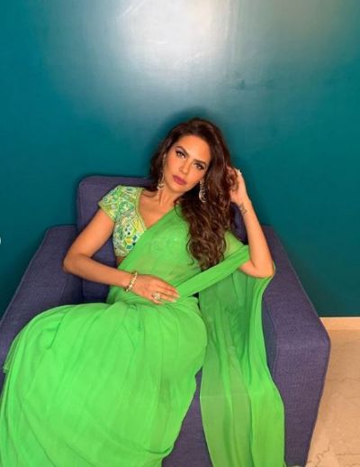 Esha Gupta looks ravishing in a green saree