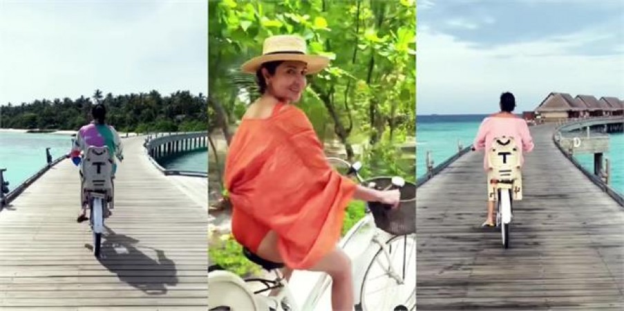 Anushka rides a cycle on the sea track with daughter Vamika