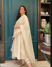 Mom-to-be Anushka Sharma glows in white Anarkali suit on Diwali, Know its price