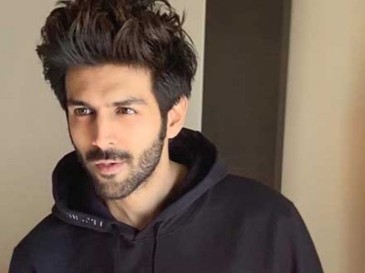 Kartik Aaryan steps out of his car in crowded Delhi street, waves at fan who calls him ‘bhai’