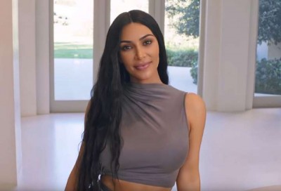Kim Kardashian looks glamorous in red and black outfit, shares photo