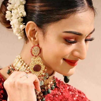 Erica Fernandes shares this photo wearing red lehenga