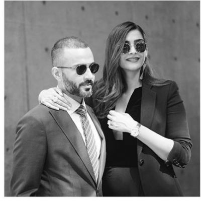 Sonam Kapoor & Anand Ahuja steal light in black & white  from the Giorgio Armani show