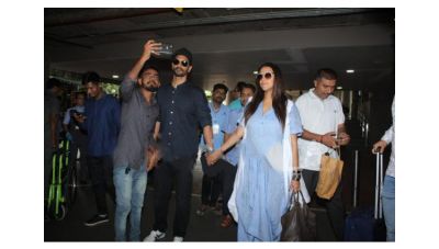 Pics: Neha Dhupia flaunts her baby bump as Angad Bedi walks hand-in-hand with her at Airport