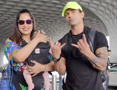 Actors Bipasha Basu and her husband left Mumbai for first family holiday with their daughter Devi