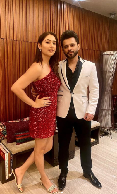 Rahul Vaidya and Disha Parmar pose together while she looks stunning in red