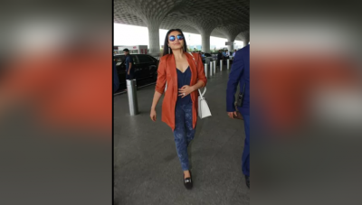 Rani Mukerji made splash at the airport with her chirpy smile