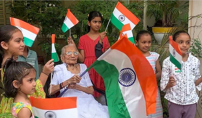 'Har Ghar Tiranga' campaign:  PM Modi's mother distributes national flags
