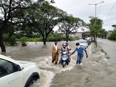 2 men go missing as bike overturns at a flooded highway in Telangana