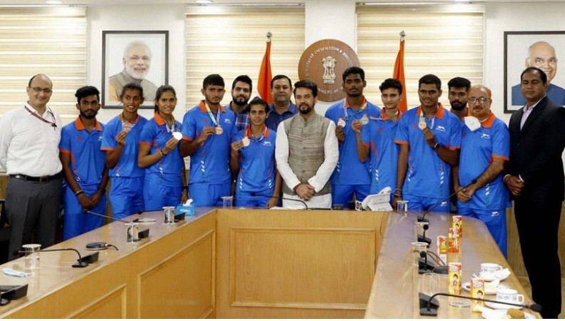 Sports Minister Anurag Thakur interacts with athletes and medalists