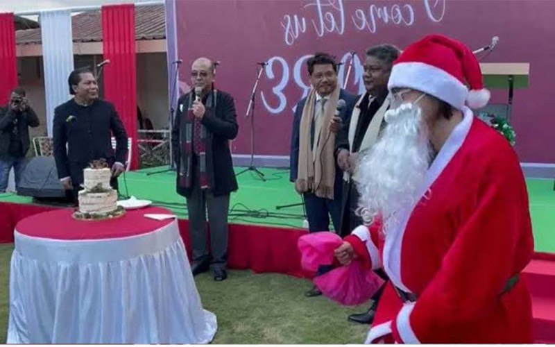 CM of Meghalaya, the leader of opposition, and the speaker share the stage to sing Christmas carols