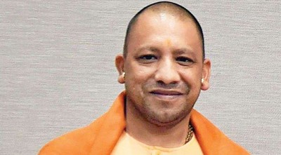Yogi distributes rural residential rights docs to 11-lakh families