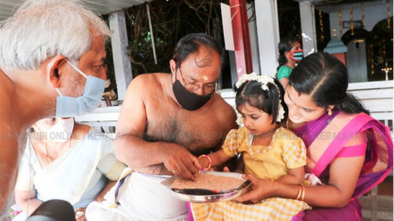 Kerala: Children initiated into world of letters On Vijayadashmi