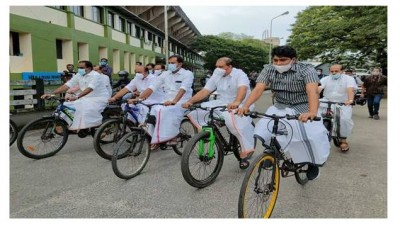 Kerala's opposition MLAs protest by riding their bicycles to the Assembly