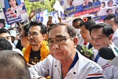 Thai PM highlights experience before challenging election
