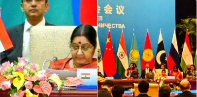 China's foreign minister Wang Yi  welcomes  EAM Swaraj in  SCO meet 2018