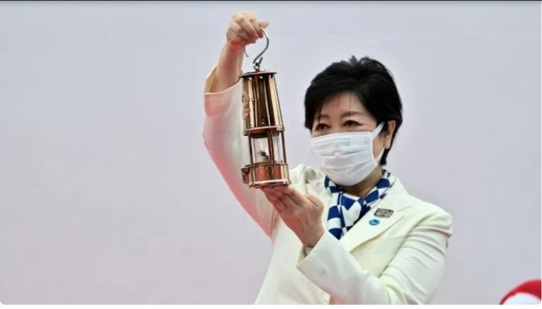 Olympic flame reaches in Tokyo for no-watcher relay