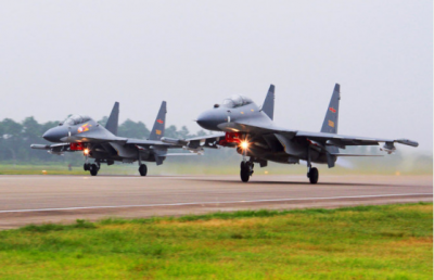 China displays its strength by sending a sizable group of warplanes and navy ships towards Taiwan