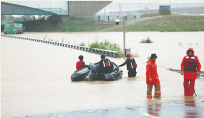 26 South Koreans are killed as a result of flooding and heavy rain