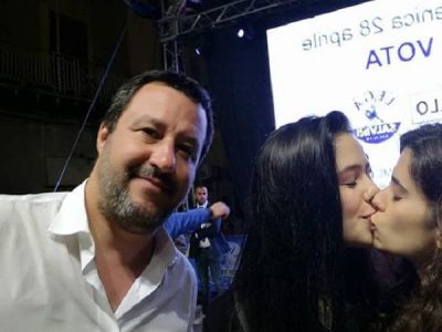 Two women photobomb anti-LGBTQ politician's selfie by kissing each other, photo goes viral