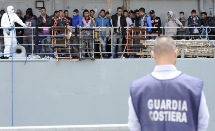 Nearly 600 migrants are saved by a charity ship off Italy