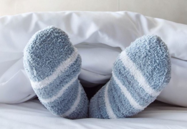 Can You Sleep Wearing Socks in Winter? Find Answers to Key Questions Here