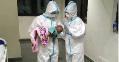 कोरोना का शिकार हुई माँ, अब नर्स रख रही तीन माह की बच्ची का ध्यान