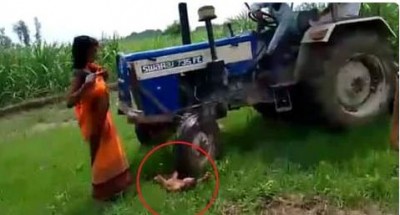 Video: खेत की जुताई रुकवाने के लिए महिला ने ट्रैक्टर की आगे फेंक दी दुधमुंही बच्ची