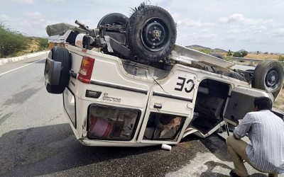 Horrific accident: Carr overturned on road after colliding with divider