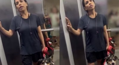 लिफ्ट में कुत्ते को लेकर फिर छिड़ी जंग, वायरल हुआ VIDEO