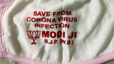 WB BJP Unit Distribute Masks With 'Save From Coronavirus Infection, Modi Ji' Printed On It