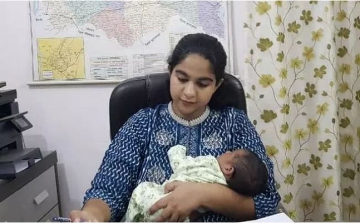 Ghaziabad SDM performing duty carrying her 22 days old baby girl in arms