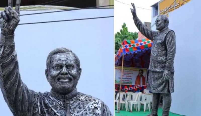 Father-son duo builds 14 feet tall statue of PM Modi with iron junk