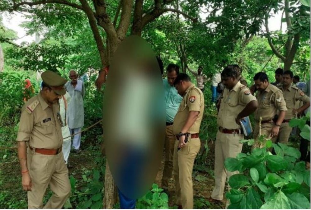 Shocking news Dead body of a middleaged man found hanging on tree