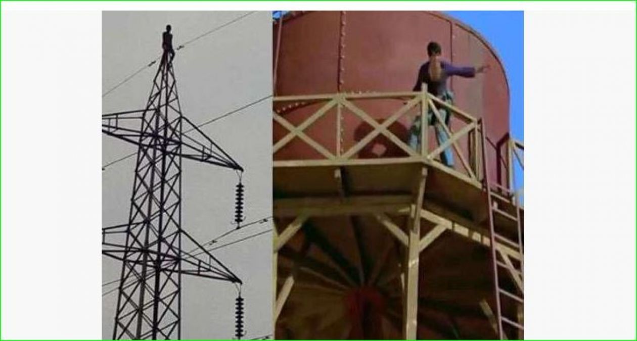 Young man climbed water tank being drunk and demands people to call his wife