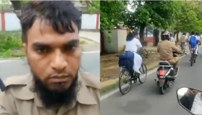 Video: Policeman Shahadat Ali was chasing the girl in the middle of the road, when the woman stopped..