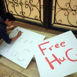 Police arrest man for giving 'free hugs' to strangers