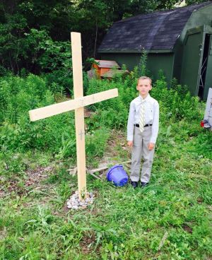 A boy gave funeral to his dead pet, with proper arrangements and dress-ups