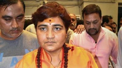 MP Sadhvi Pragyasinh Thakur sat on a dharna for being denied seat in aircraft of her choice