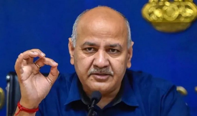 Sisodia sits on protest outside EC office saying...