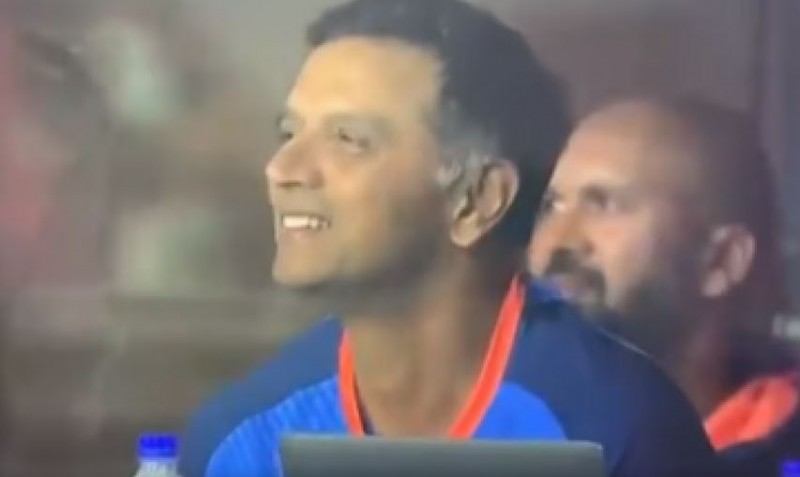 Indian Coach Rahul Dravid laughs after seeing his own records on screen ...