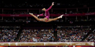 Gymnastics: Artistic Gymnastics vs. Rhythmic Gymnastics - Graceful Performances and Acrobatic Skills