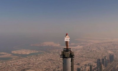 Woman standing on top of Burj Khalifa for company ad, stunned to see video