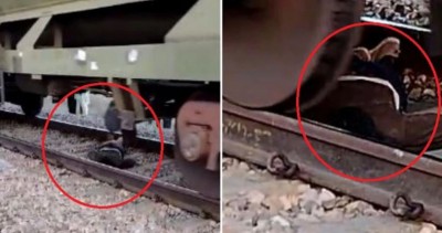Video: रेलवे ट्रैक पर बेहोश पड़ा था युवक, ऊपर से गुजर गई मालगाड़ी और फिर...